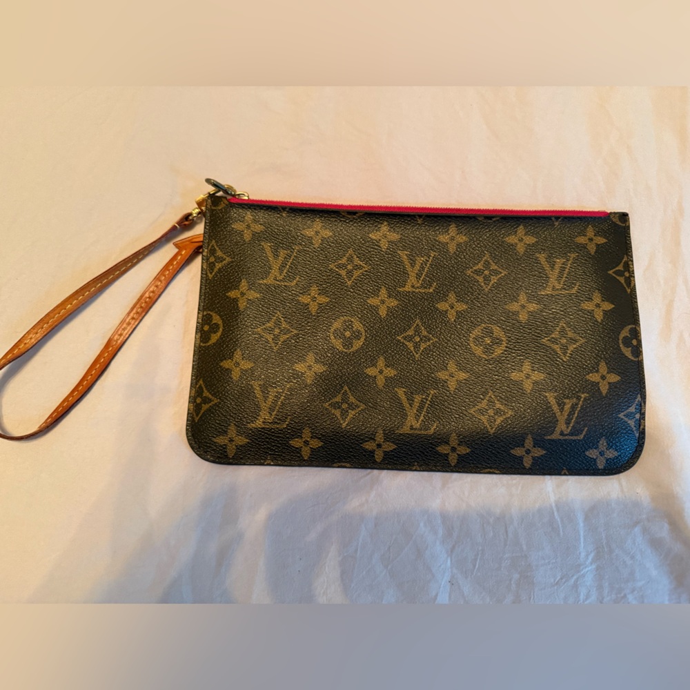 Authentic Louis Vuitton monogram canvas neverfull pink wristlet